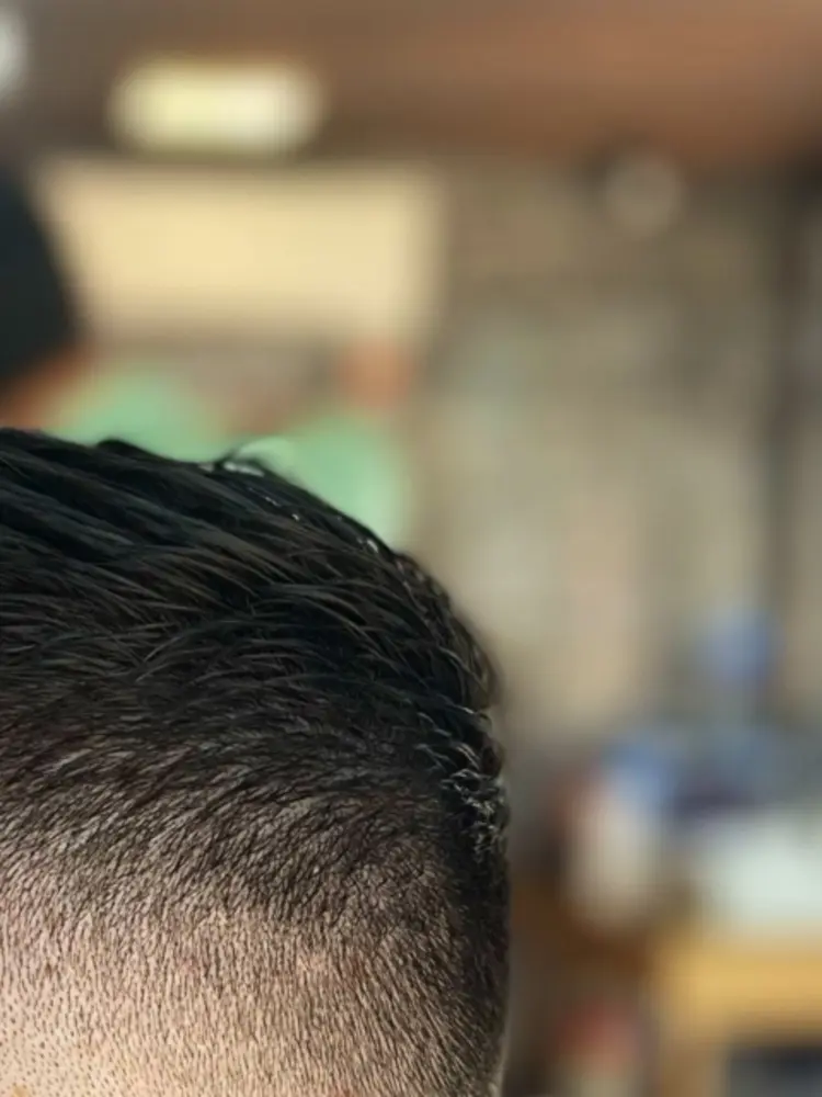 Close-up of a sharp skin fade at Adam Turkish Barber